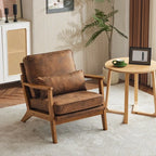 Poltrona d'accento rivestita in misto lino con gambe in legno e un cuscino, beige