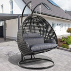 LeisureMod Sedia a Uovo Sospesa per 2 Persone con Supporto - Dondolo Pensile per Esterni/Interni in Rattan Intrecciato con Cuscini