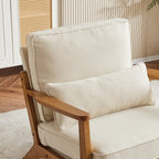 Poltrona d'accento rivestita in misto lino con gambe in legno e un cuscino, beige