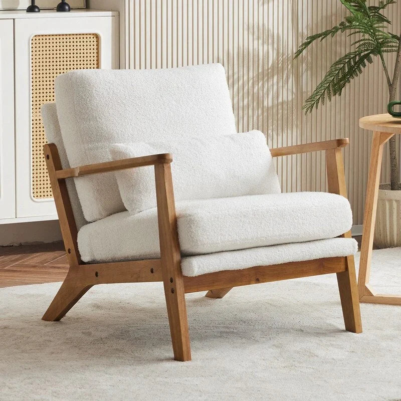 Poltrona d'accento rivestita in misto lino con gambe in legno e un cuscino, beige