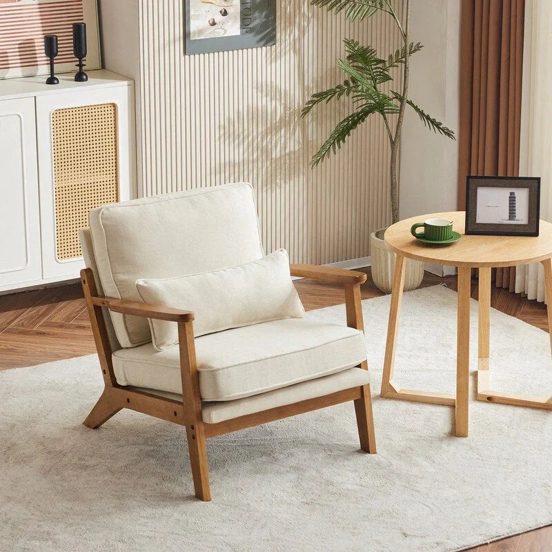 Poltrona d'accento rivestita in misto lino con gambe in legno e un cuscino, beige