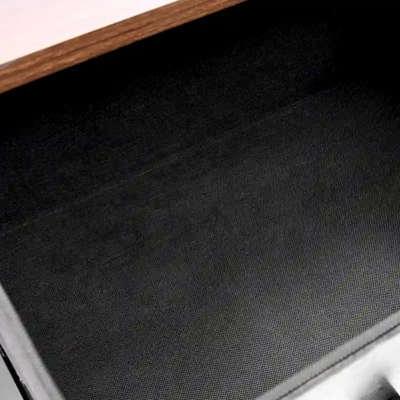 Cassettiera accentata nera in legno composito a 4 cassetti con dettagli marroni